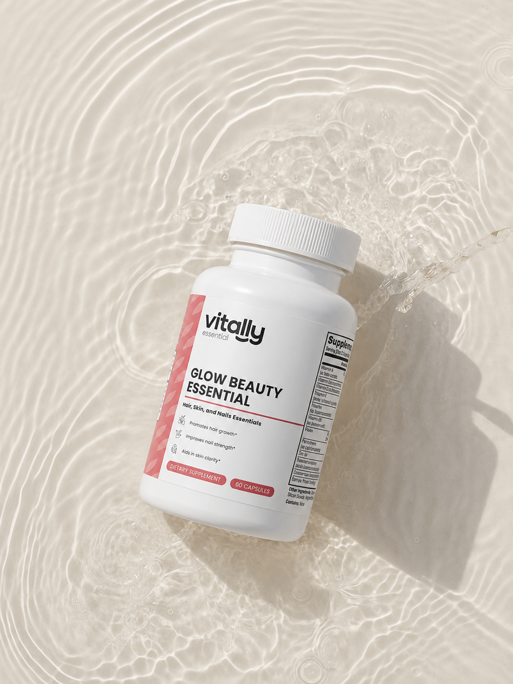A white plastic bottle of Vitally Essentials Glow Beauty Essential dietary supplement, featuring a white label with pink accents and a visible supplement facts panel on the side, set against a clean white background.