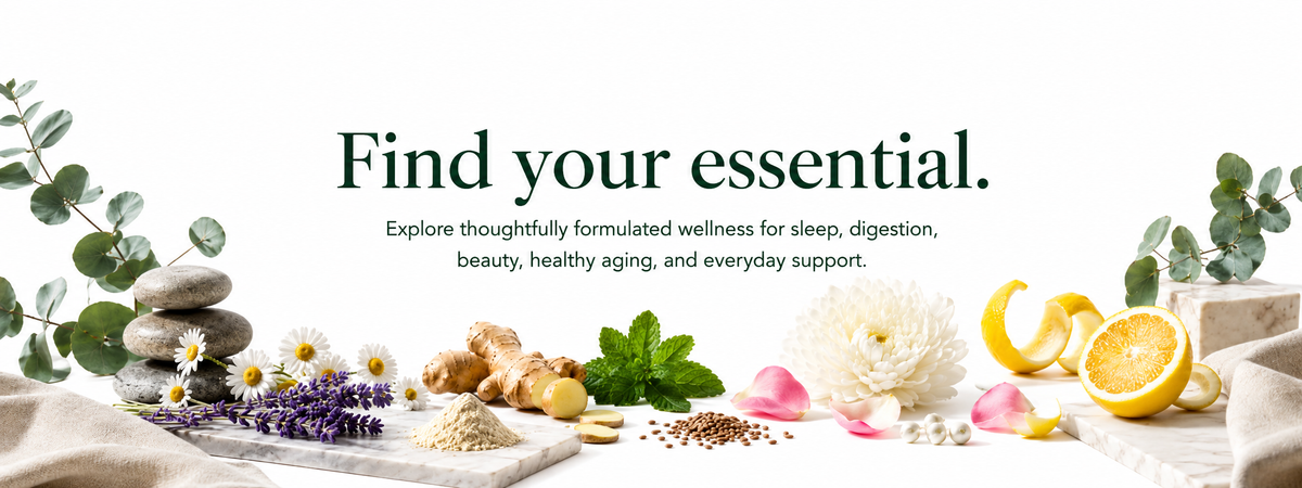 A wellness-themed banner with the text 'Find your essential.' and supporting copy, decorated with eucalyptus leaves, stones, flowers, ginger, herbs, and lemon slices on a light background.